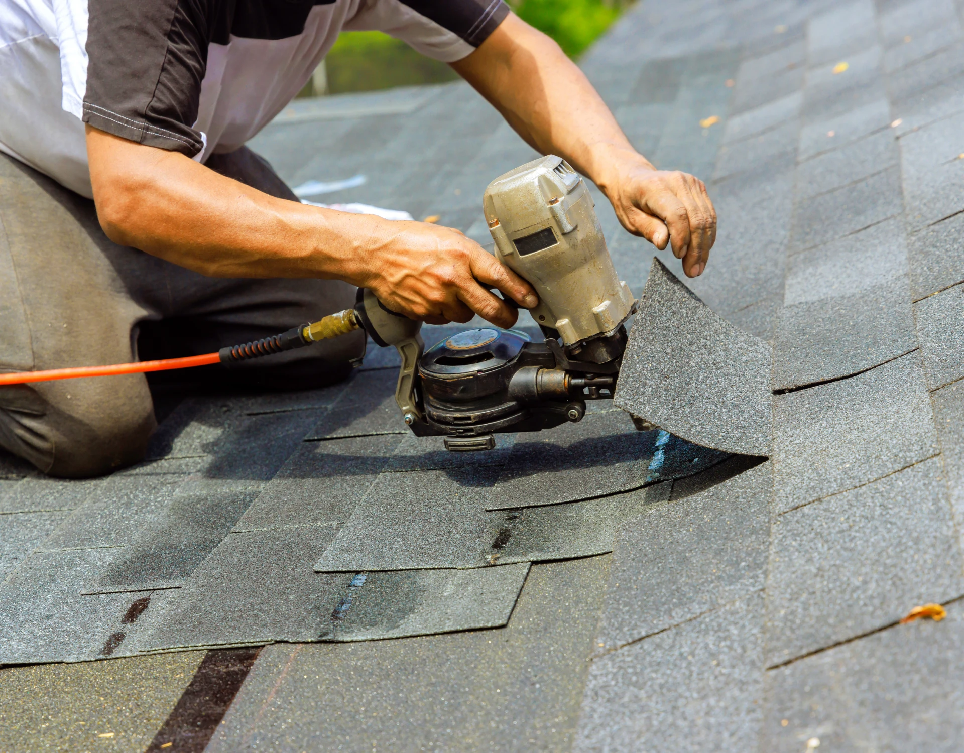 Roofing with nail gun