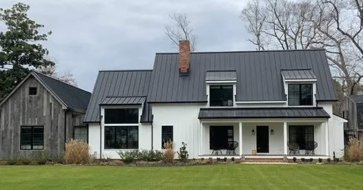 dudes house with nice metal roof